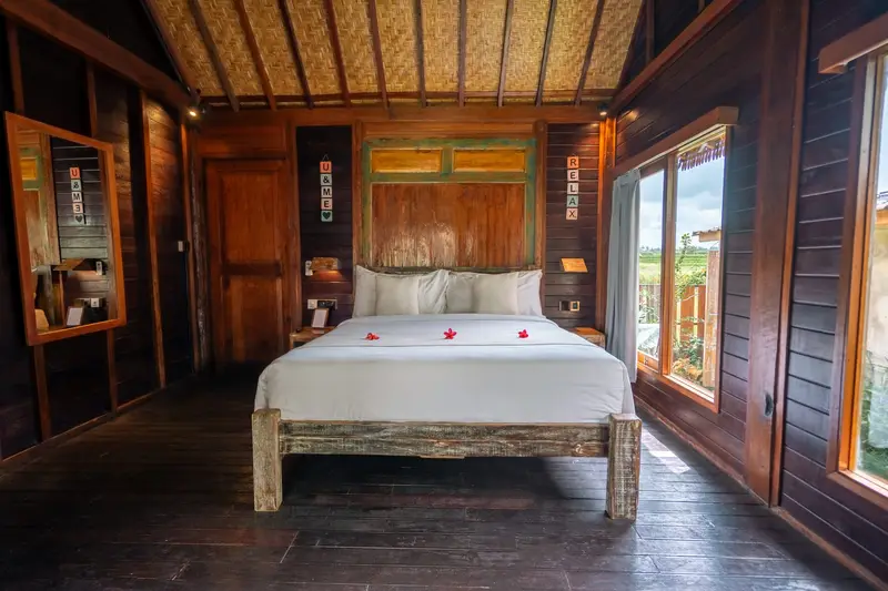 Rumah Elfi: first bedroom with a double bed