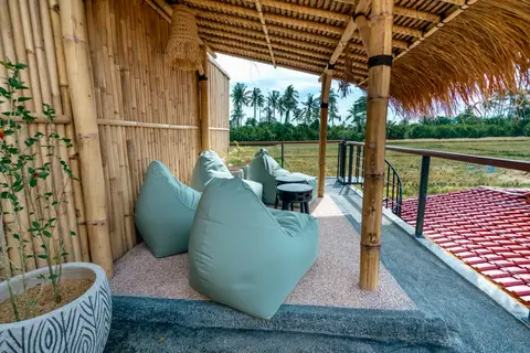 Joglo Hati: upstairs terrace with bean bags