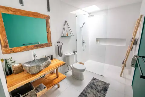 Villa Mint Satu: first bathroom with a stone washbasin