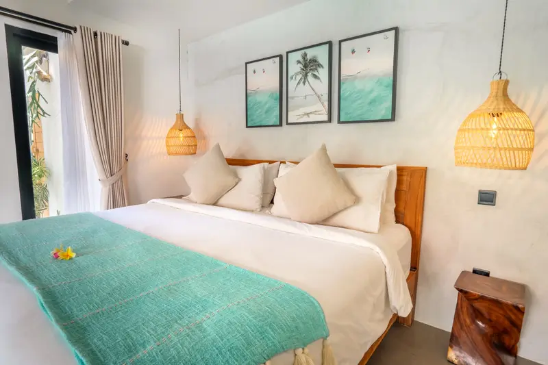 Villa Mint Satu: second bedroom with sea-themed pictures